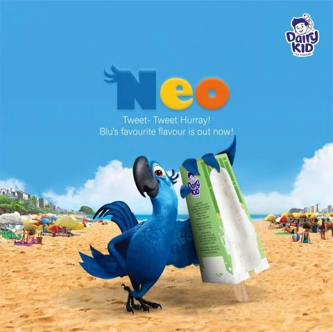 Dairy Kid Neo ice cream social post featuring the blue bird on a beach